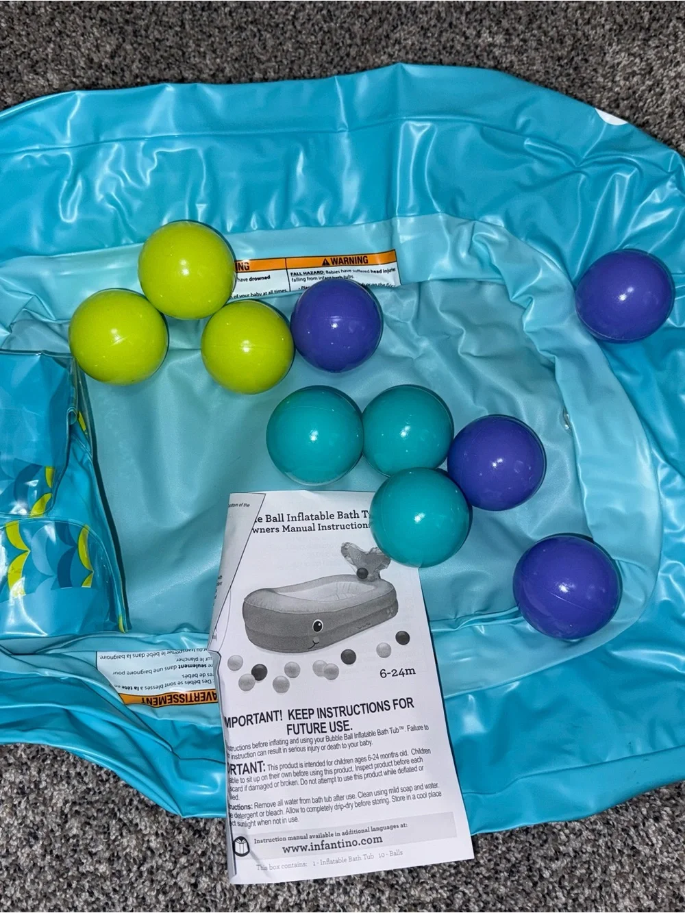 Infantino Teal Inflatable Ball Pit with Blue, Purple, and Yellow Balls